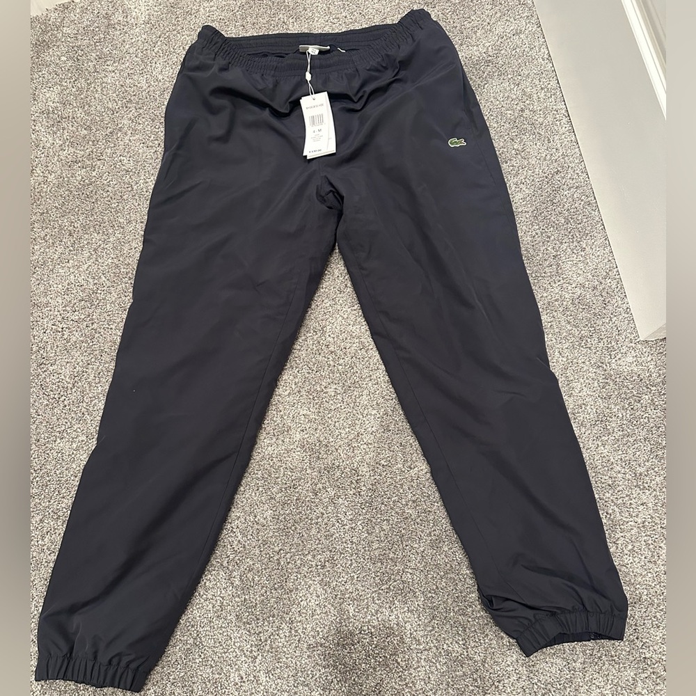 Lacoste water resistant soccer dad pants size medium NWT